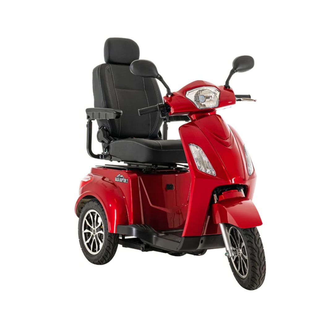Pride Mobility Baja Raptor 2 red three-wheeled mobility scooter with black cushioned seat and rearview mirrors