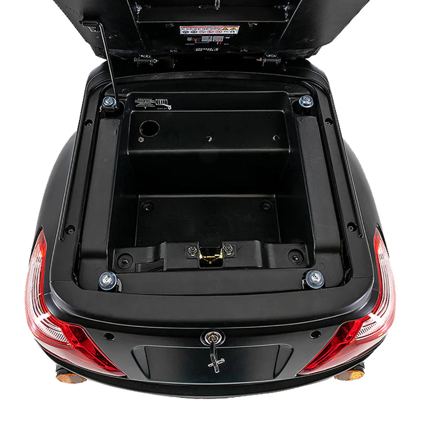 Open rear storage compartment of Pride Mobility Baja Raptor 2 with black interior and locking mechanism